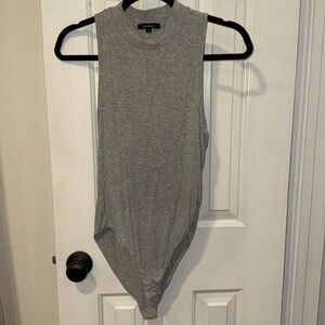 High neck ribbed sleeveless body suit